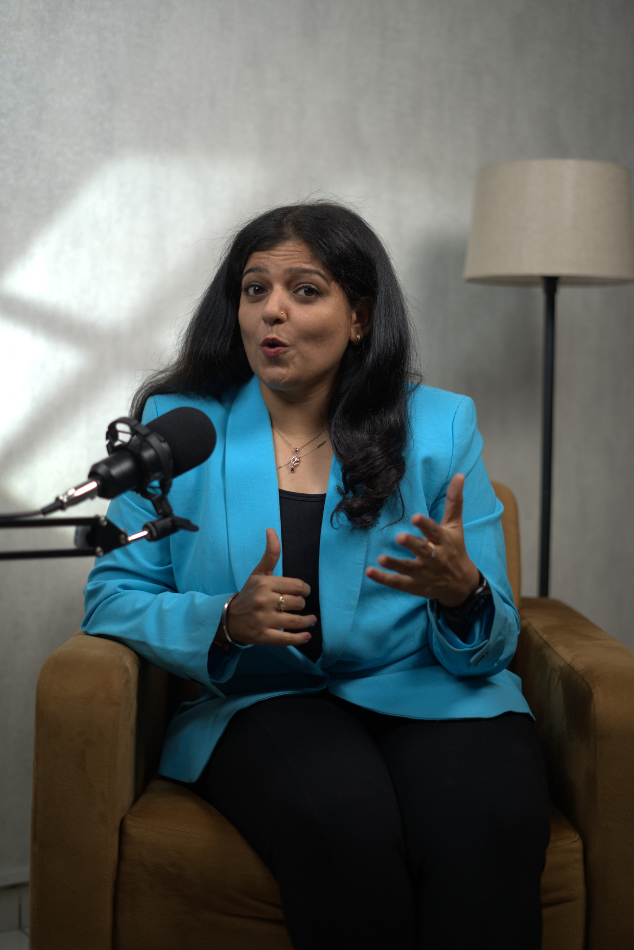 Urvashi Khandhediya hosting a podcast
